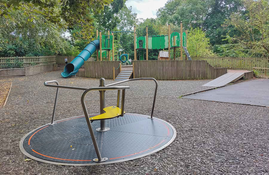 The inclusive roundabout and multi level climbing frame at Brockhill Country Park.