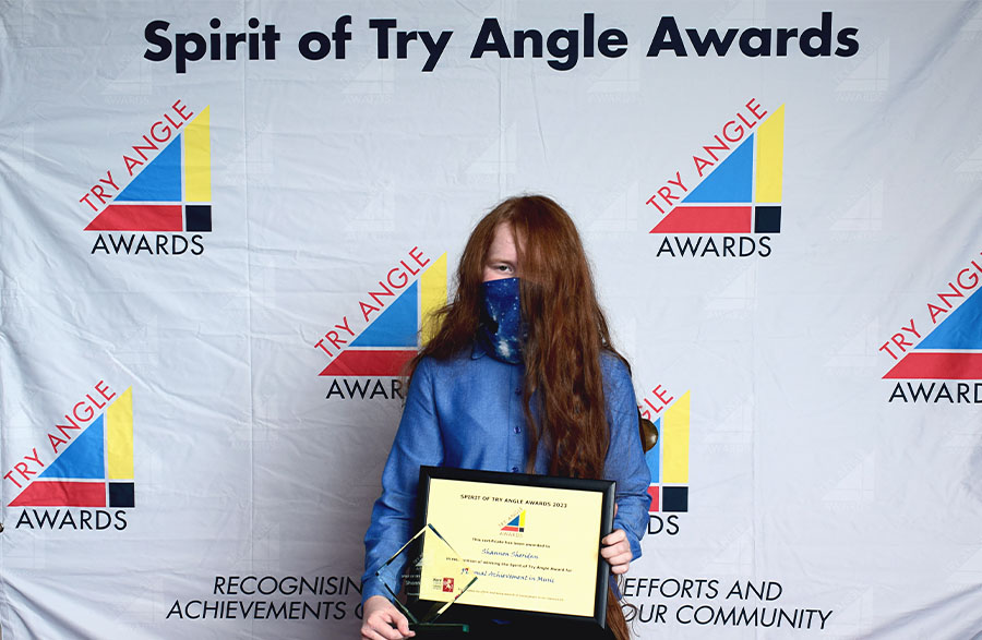 Image of Shannon Sheridan accepting the Spirit Winner for Music award