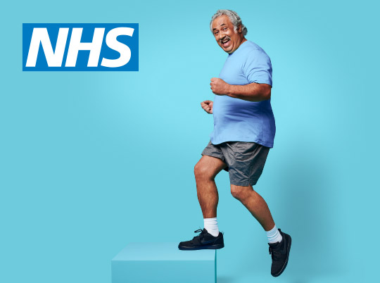 Man exercising on a step