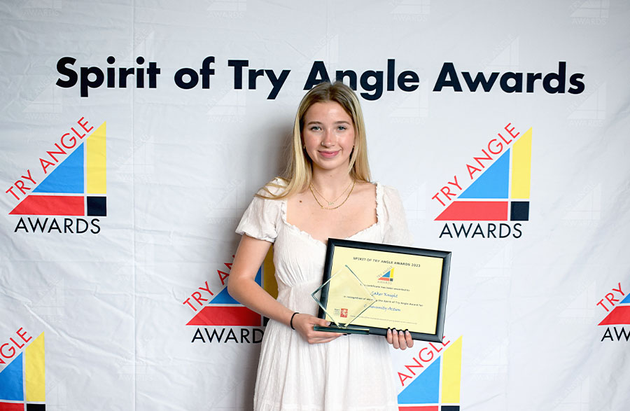 Image of Laker Knight accepting the Spirit Winner for Community Action award