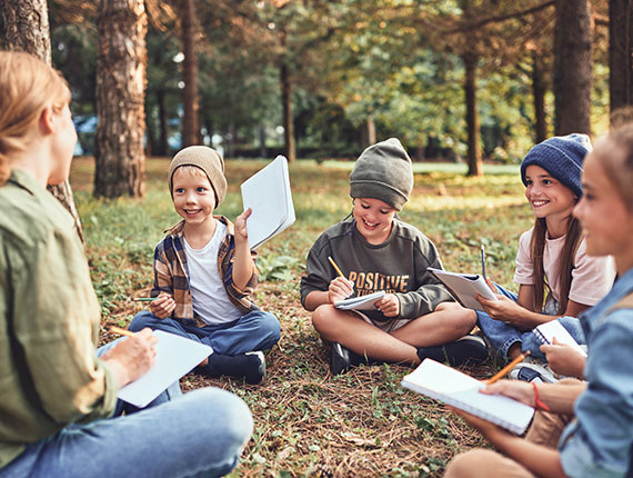 A group of people taking part in an outdoor learning activity